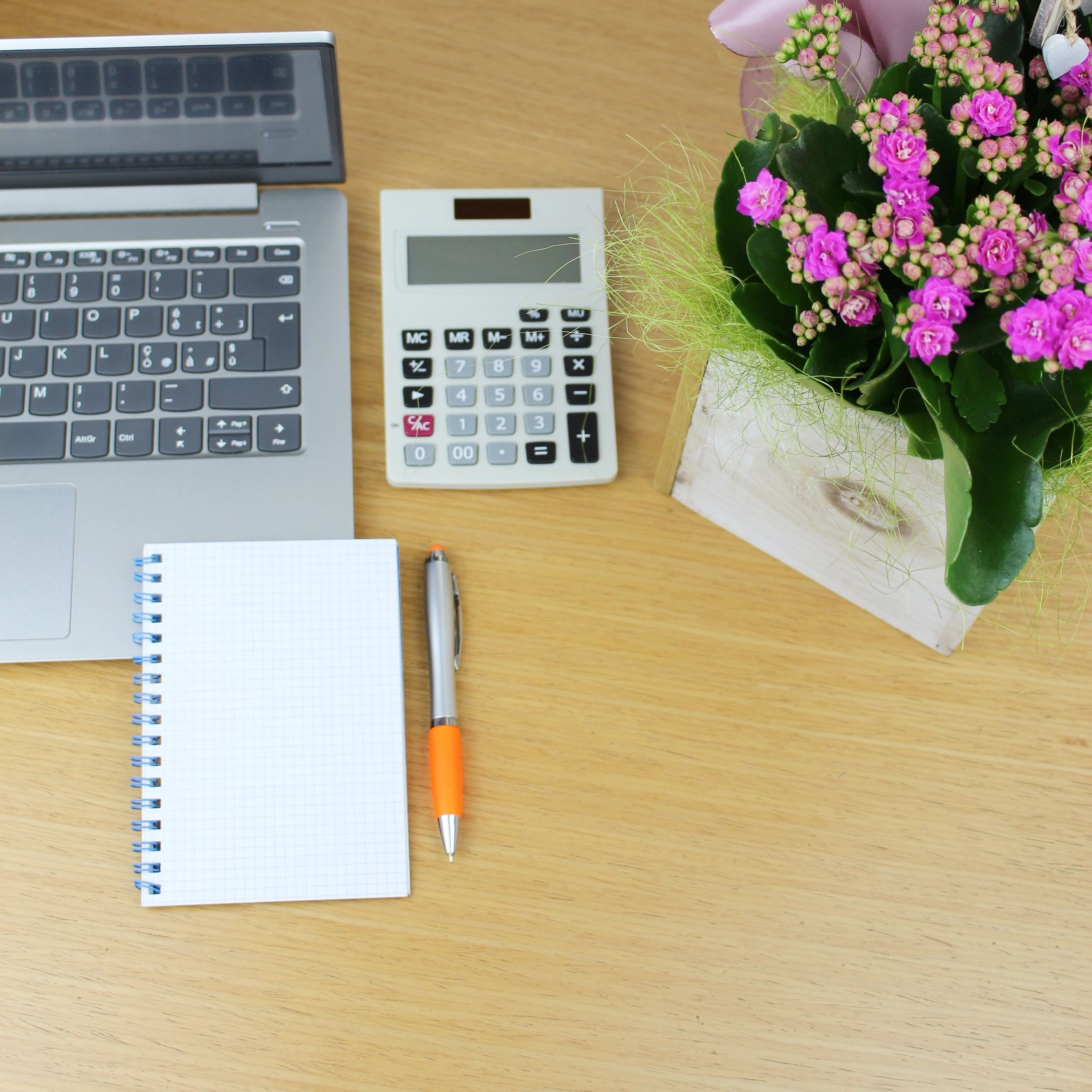 Calculator and tax documents on a desk