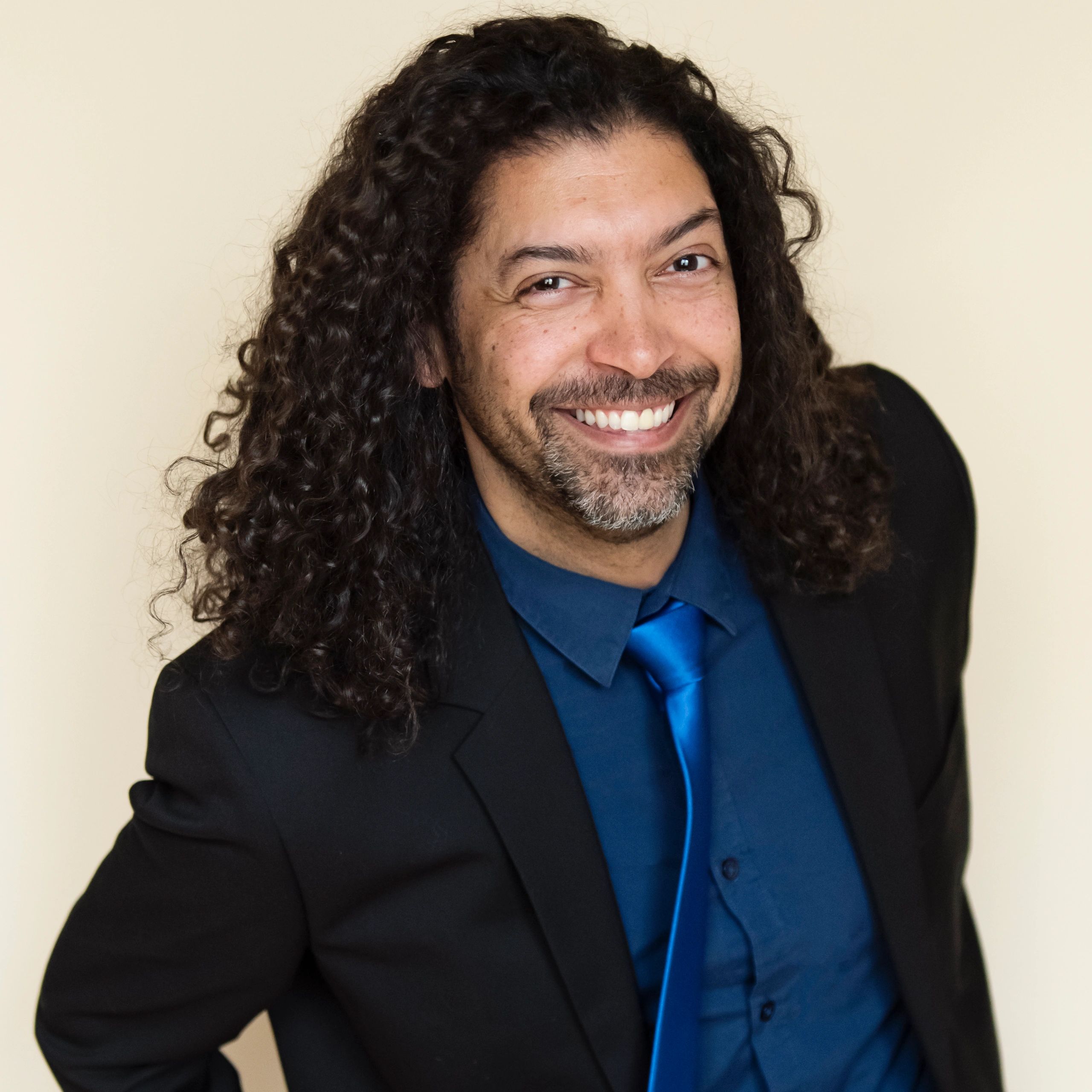 Professional headshot of a client testimonial author